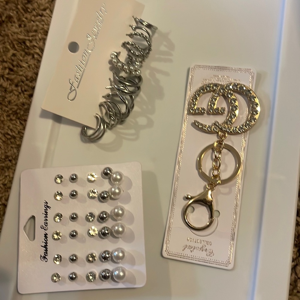 Bundle Deal. Brand new. 
Fashion earrings and a key chain